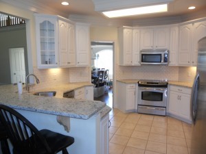 The clients were looking for a great way to update their kitchen and chose a cool white painted kitchen! (Click for larger image)