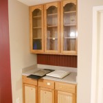 Antique white cabinets with brown glaze before photo