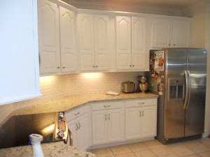 Cool white painted kitchen cabinets