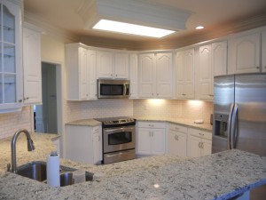 Cool white painted kitchen cabinets