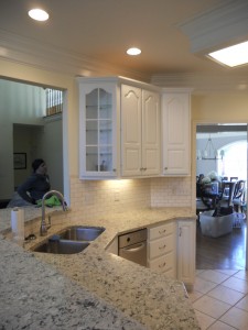 Cool white painted kitchen cabinets