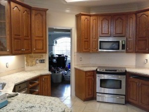 Cool white painted kitchen cabinets before