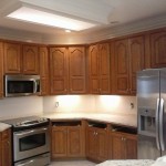 Cool white painted kitchen cabinets before