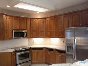 Cool white painted kitchen cabinets before